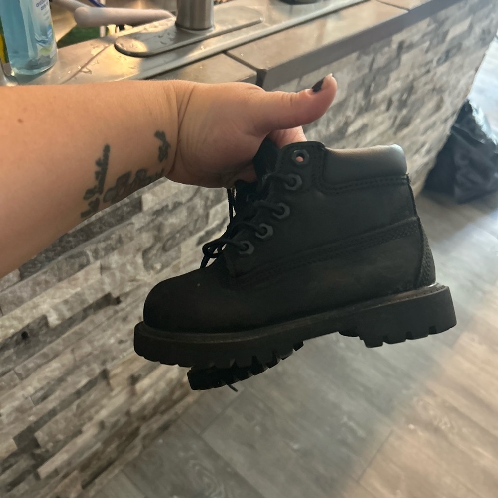 Black Timberland laced boots